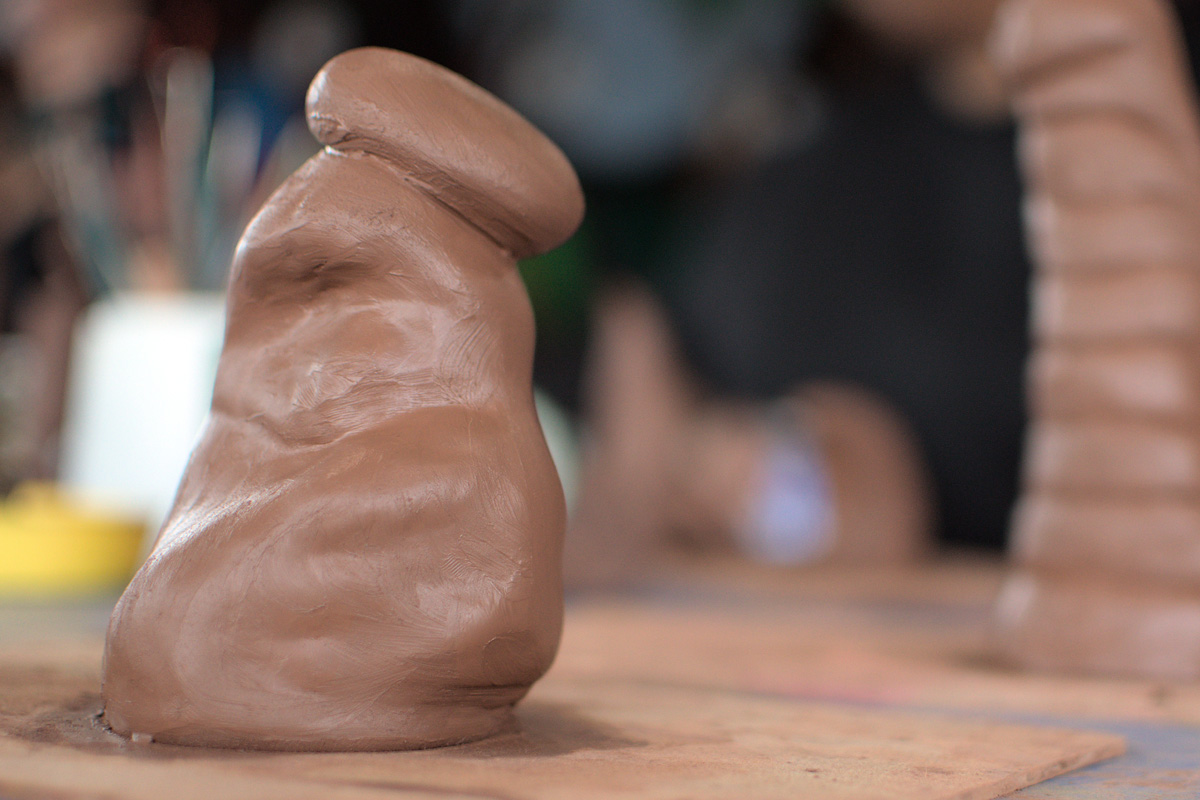 hands working with clay