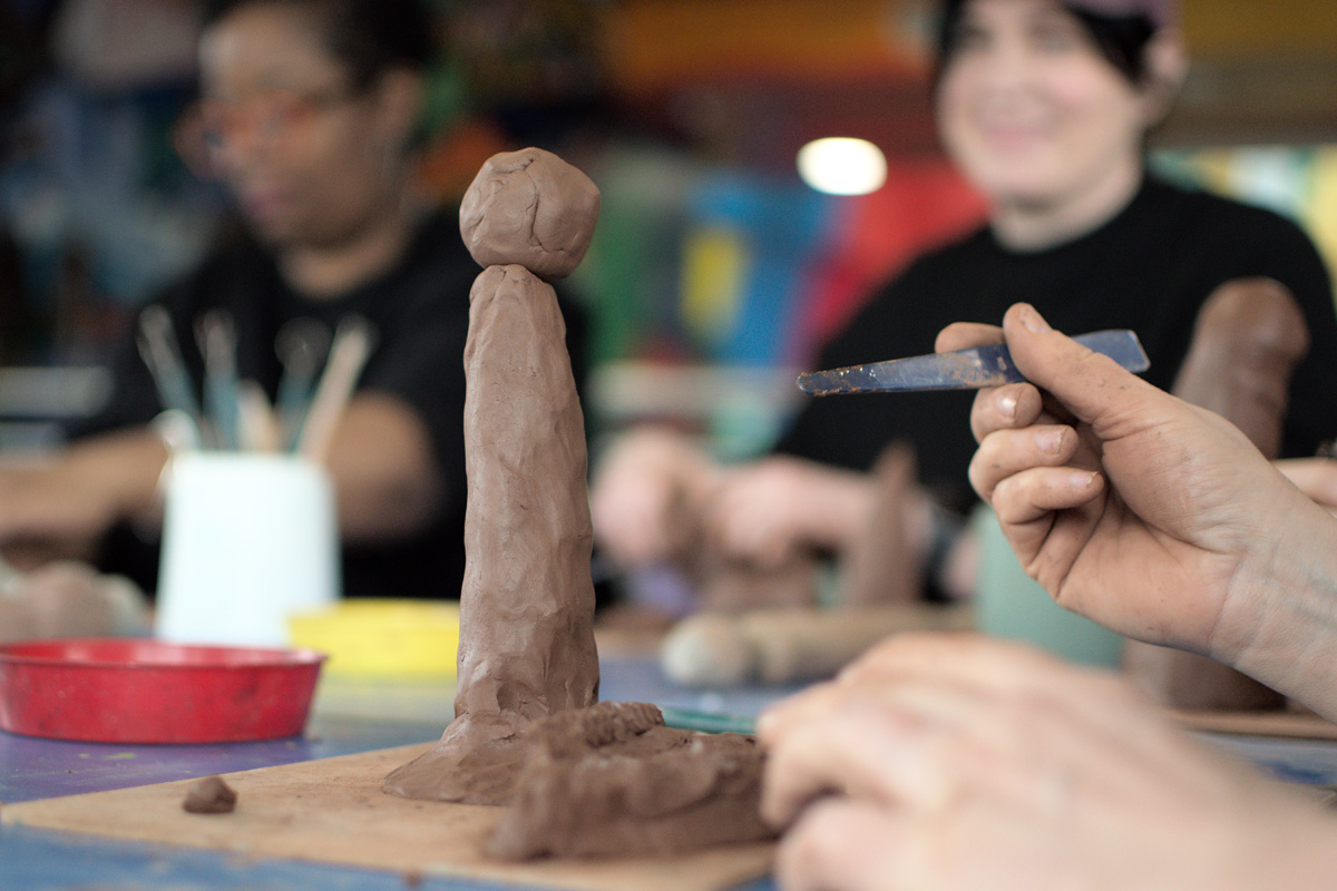hands working with clay