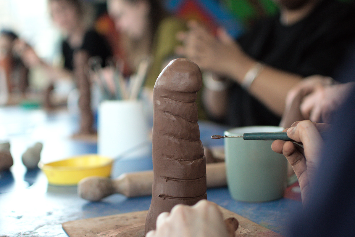 hands working with clay