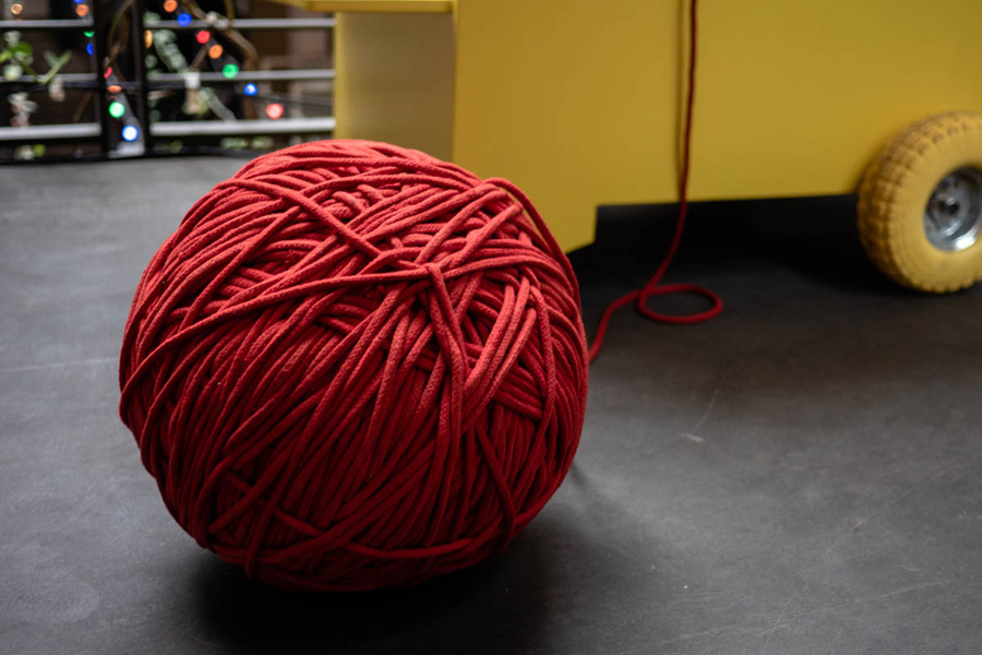 giant ball of string used to record hours worked